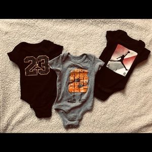 Set of Nike bodysuits